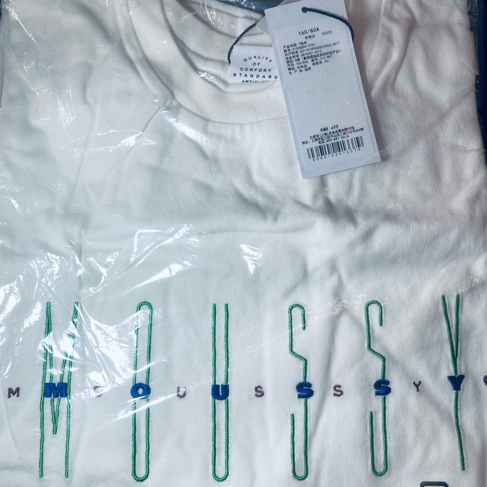 White colored Moussy logo shirt